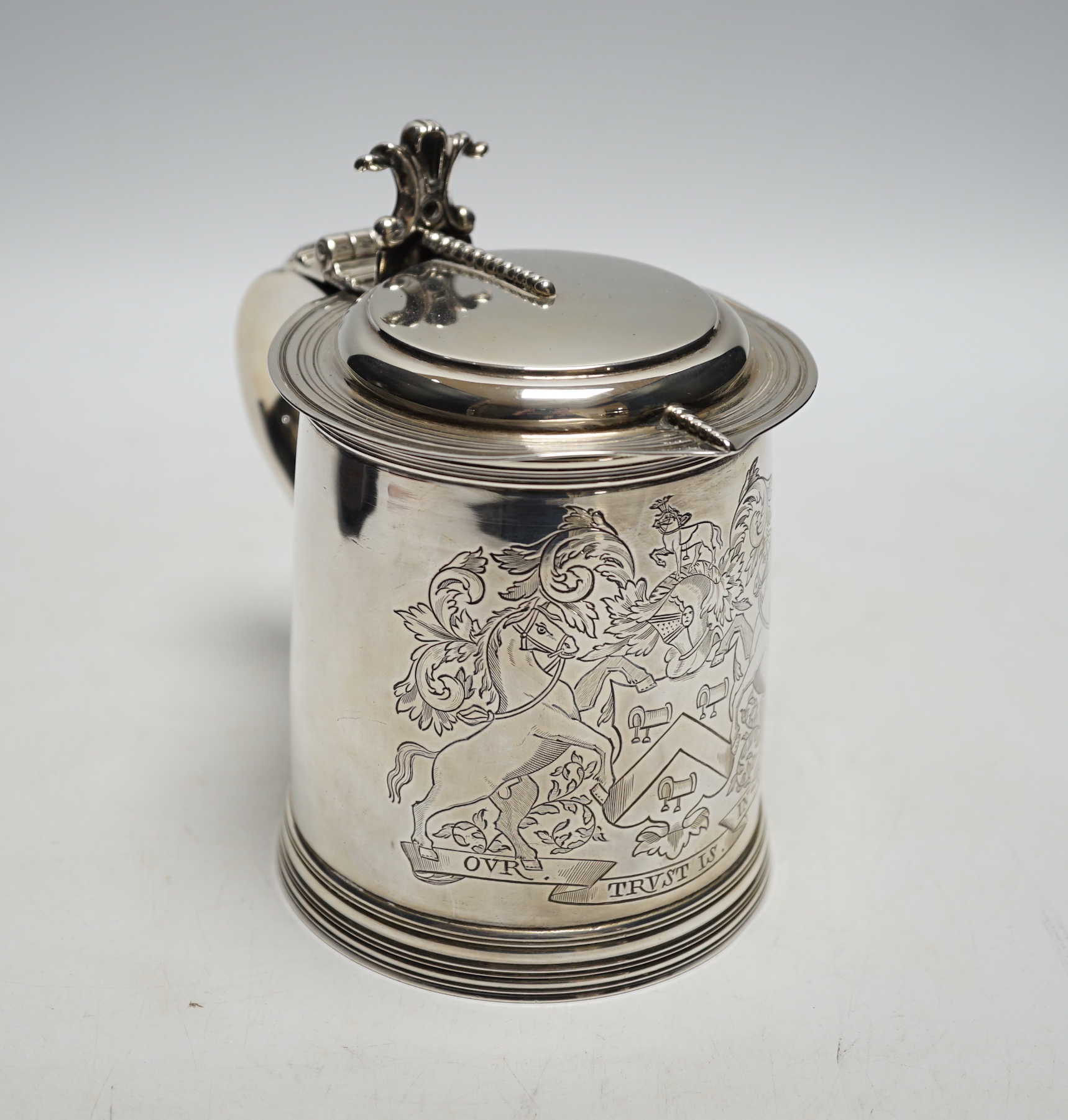 A late Victorian silver tankard, with engraved crest and the motto 'Our Trust is in God', William & John Barnard, London, 1894, 14.4cm, 17oz.
